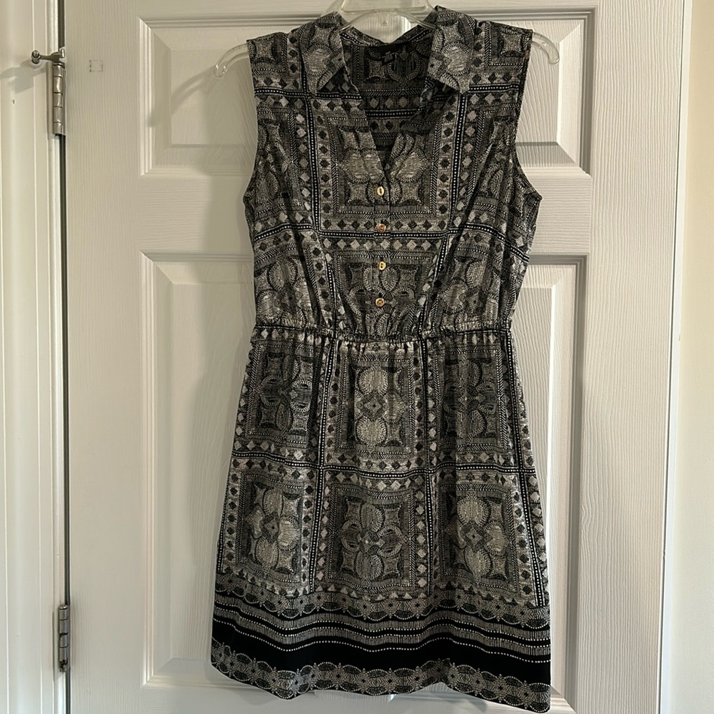 Black and white dress with collar and gold buttons